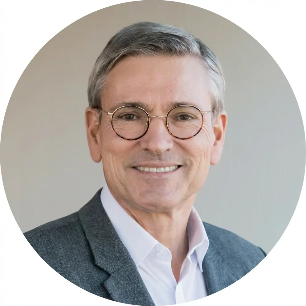 Professional headshot of John Vissing