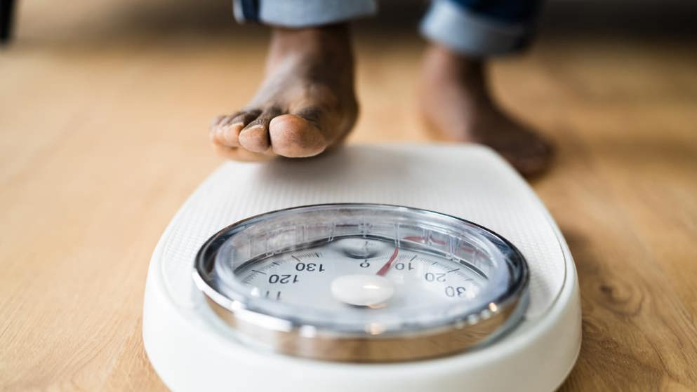 man on scales Weight management in Type 2 Diabetes Teasers